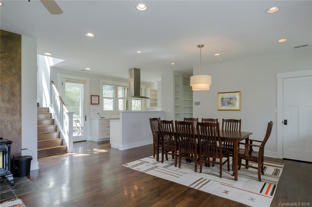 835 Secluded Valley Road Marshall, NC 28753 - Photo 8 of 21 a view of a a dining room with furniture window and wooden floor