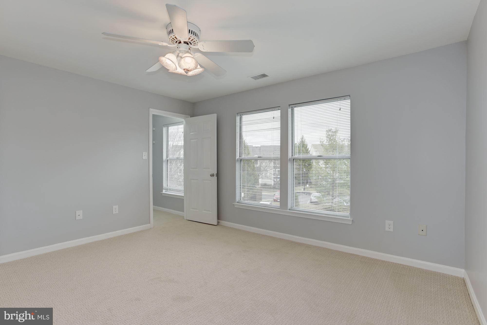 20579 Snowshoe Square, Unit 301 Ashburn, VA 20147 - Photo 24 of 30 a view of an empty room with a window