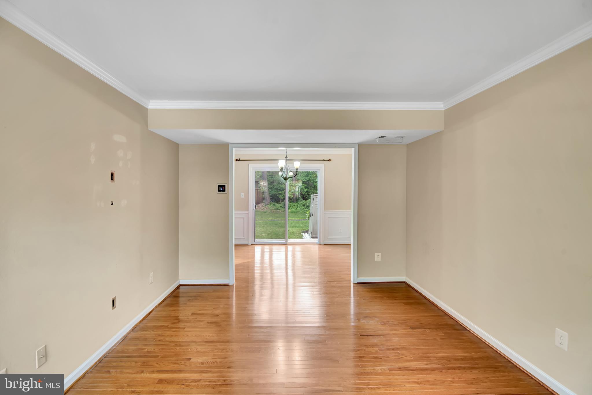 7772 Brandeis Way Springfield, VA 22153 - Photo 3 of 34 Living room looking into dining area