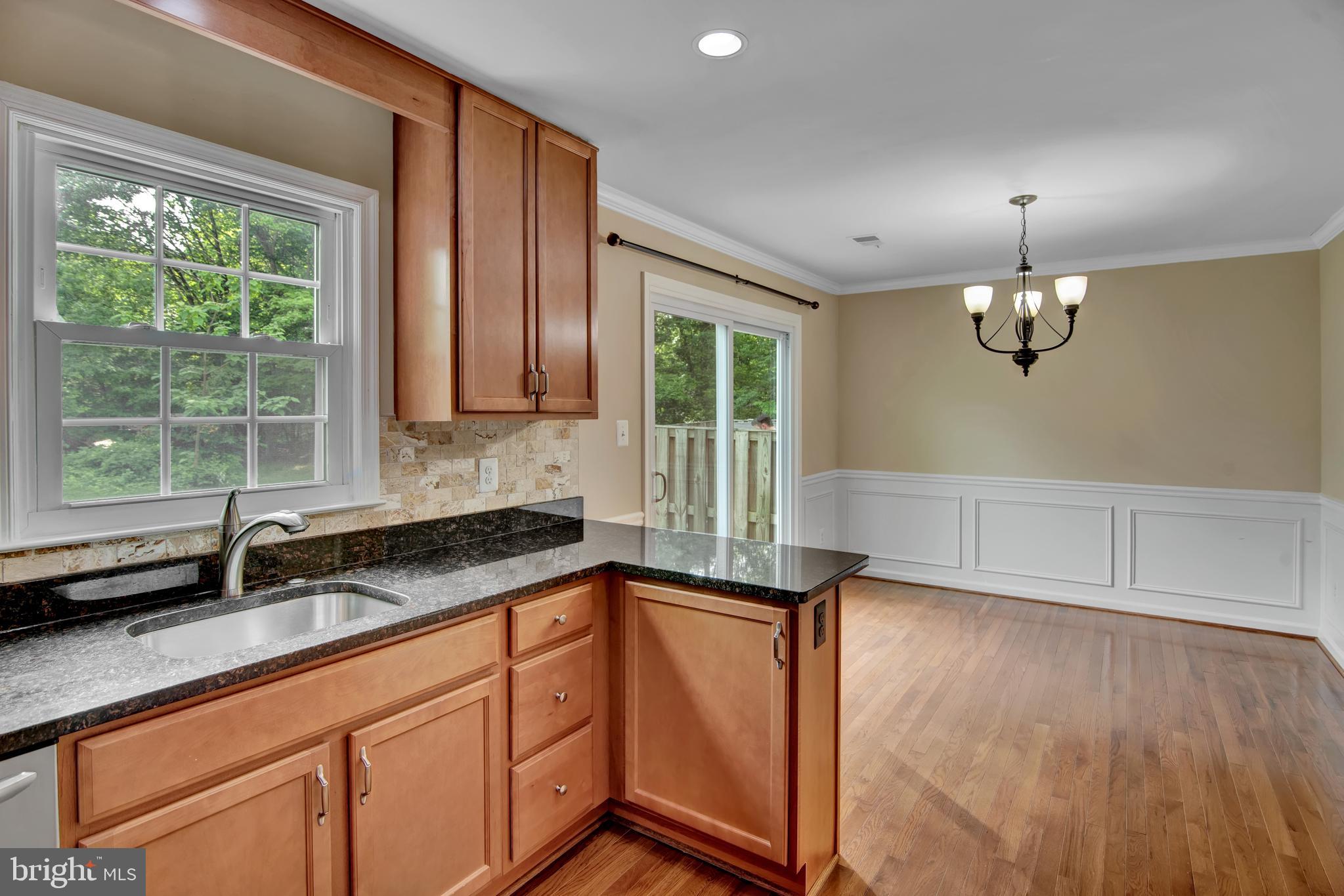 7772 Brandeis Way Springfield, VA 22153 - Photo 4 of 34 Kitchen looking into dining area