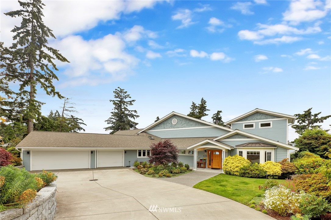 530 Bayside Road Bellingham, WA 98225 - Photo 2 of 40 a front view of a house with garden