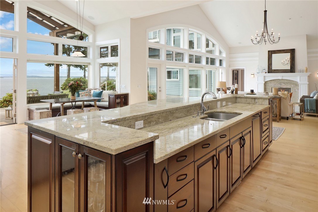 530 Bayside Road Bellingham, WA 98225 - Photo 13 of 40 a kitchen with stainless steel appliances granite countertop a sink and a stove