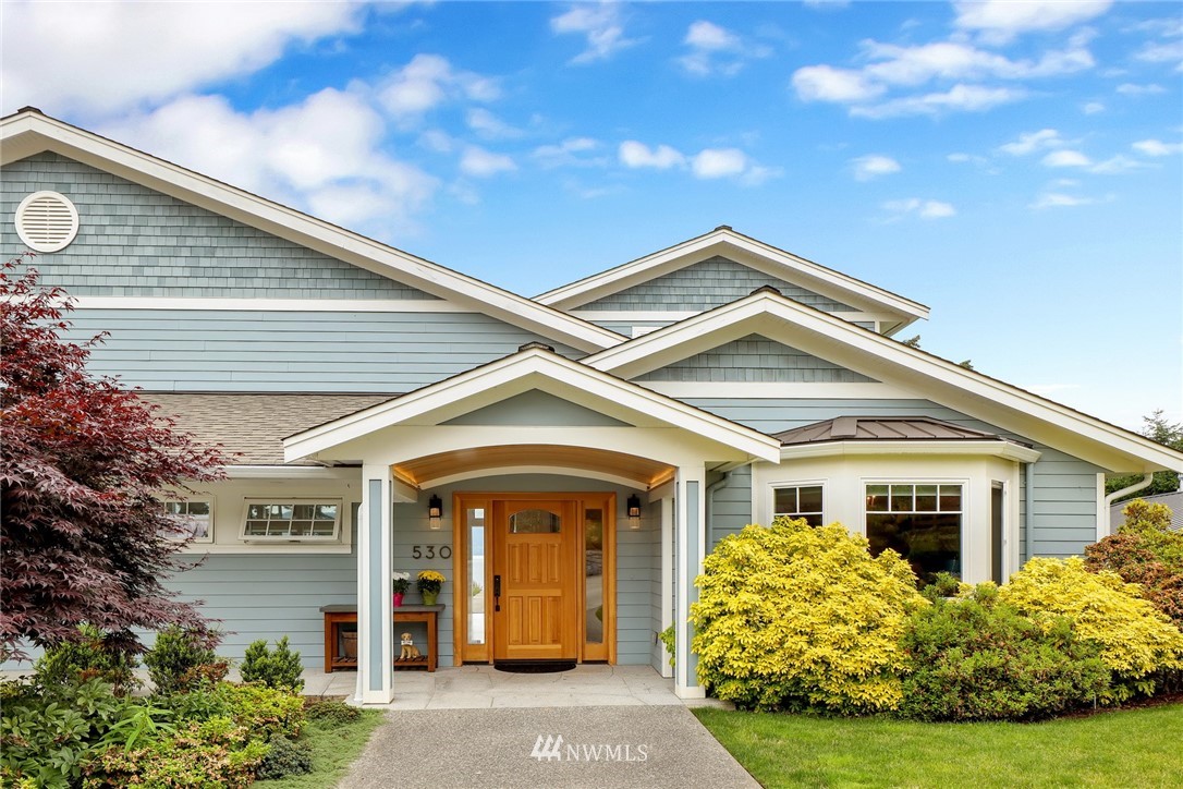 530 Bayside Road Bellingham, WA 98225 - Photo 3 of 40 a front view of a house with garden