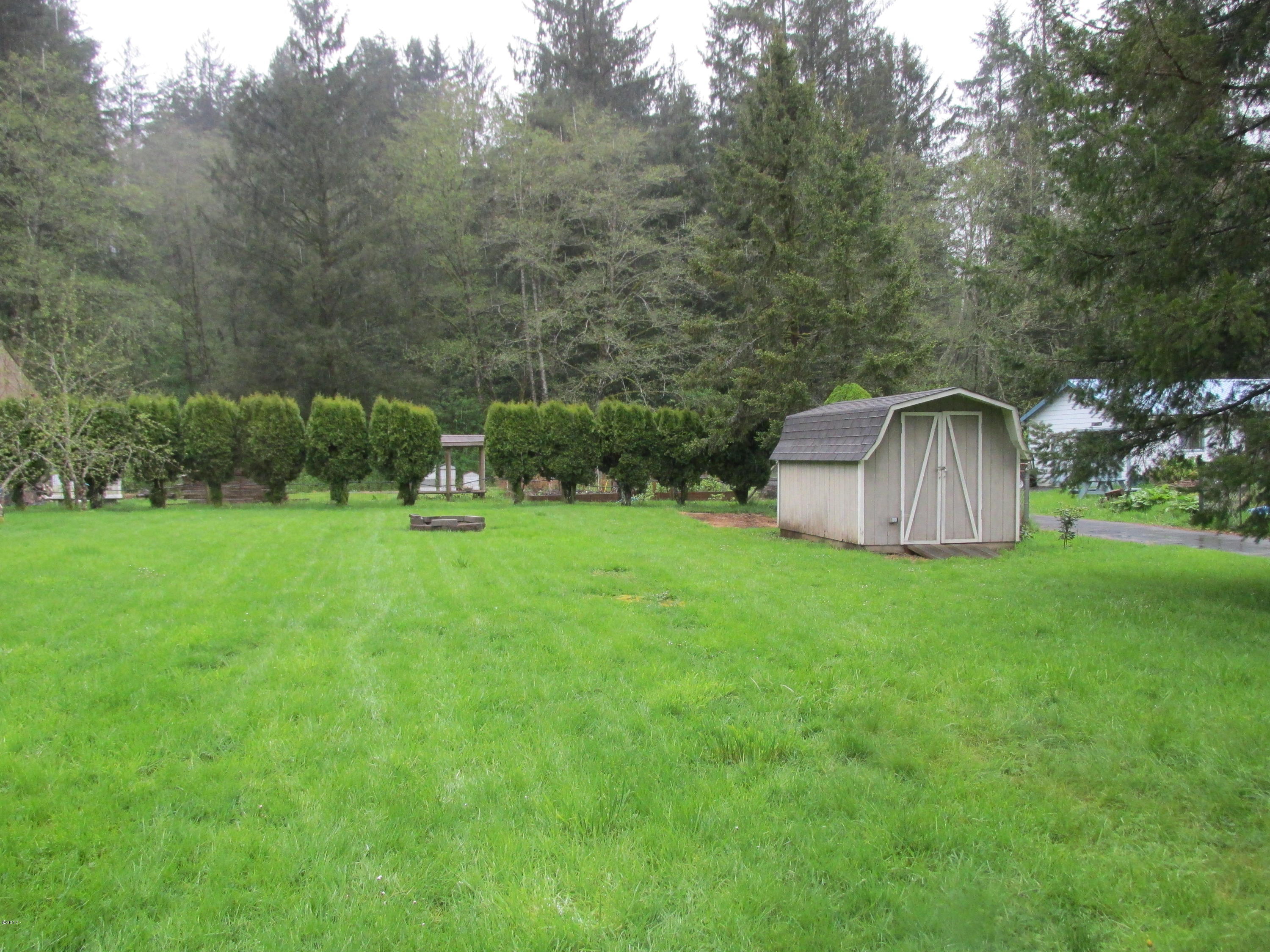 4634 Brickyard Road Tillamook, OR 97141 - Photo 5 of 13 Back yard with shed