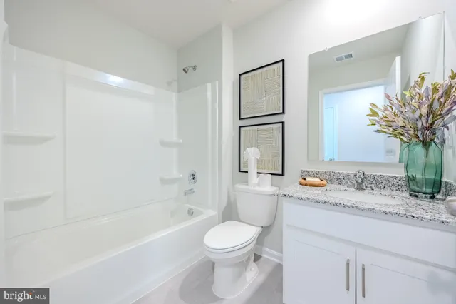 a view of a swimming pool and a bench