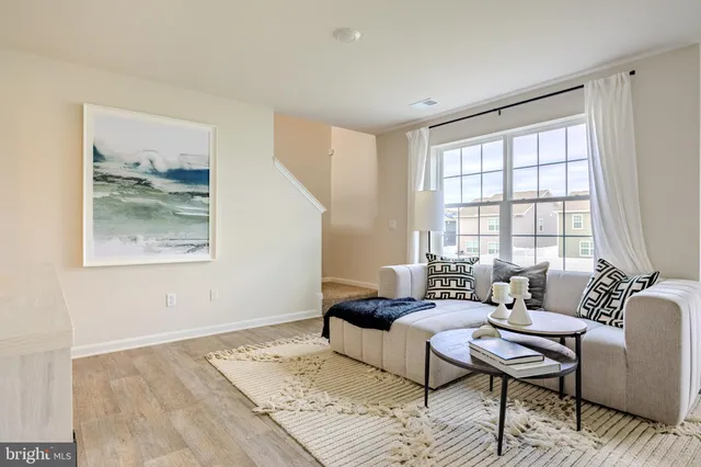 a kitchen with sink cabinets and dining table