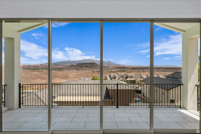 1620 Belayer Drive St. George, UT 84770 - Photo 37 of 51 Expansive outdoor balcony featuring large format tile flooring and black metal railings