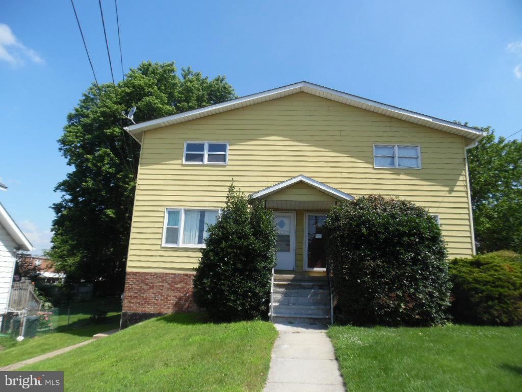 6914 German Hill Road Baltimore, MD 21222 - Photo 1 of 28 a front view of house with a garden
