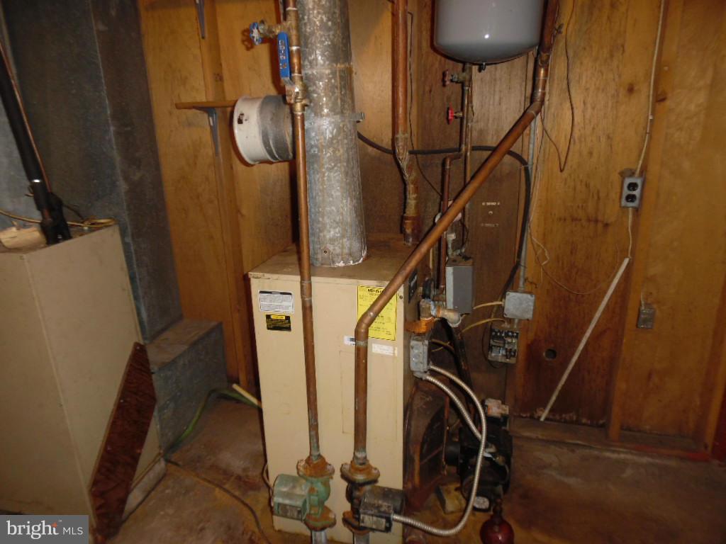 6914 German Hill Road Baltimore, MD 21222 - Photo 16 of 28 a view of a room with storage and utility