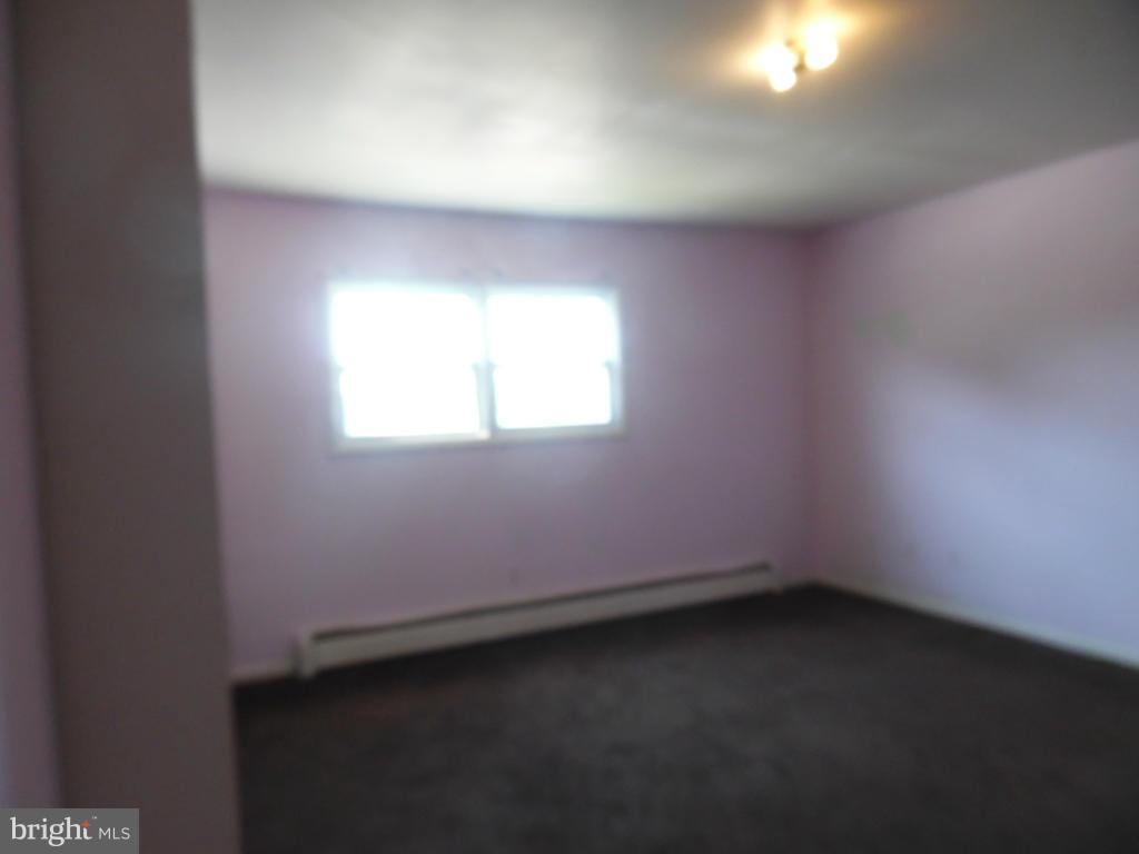 6914 German Hill Road Baltimore, MD 21222 - Photo 19 of 28 an empty room with a window