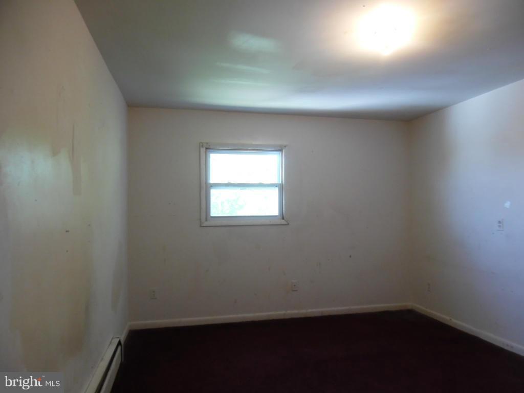 6914 German Hill Road Baltimore, MD 21222 - Photo 23 of 28 an empty room with a window