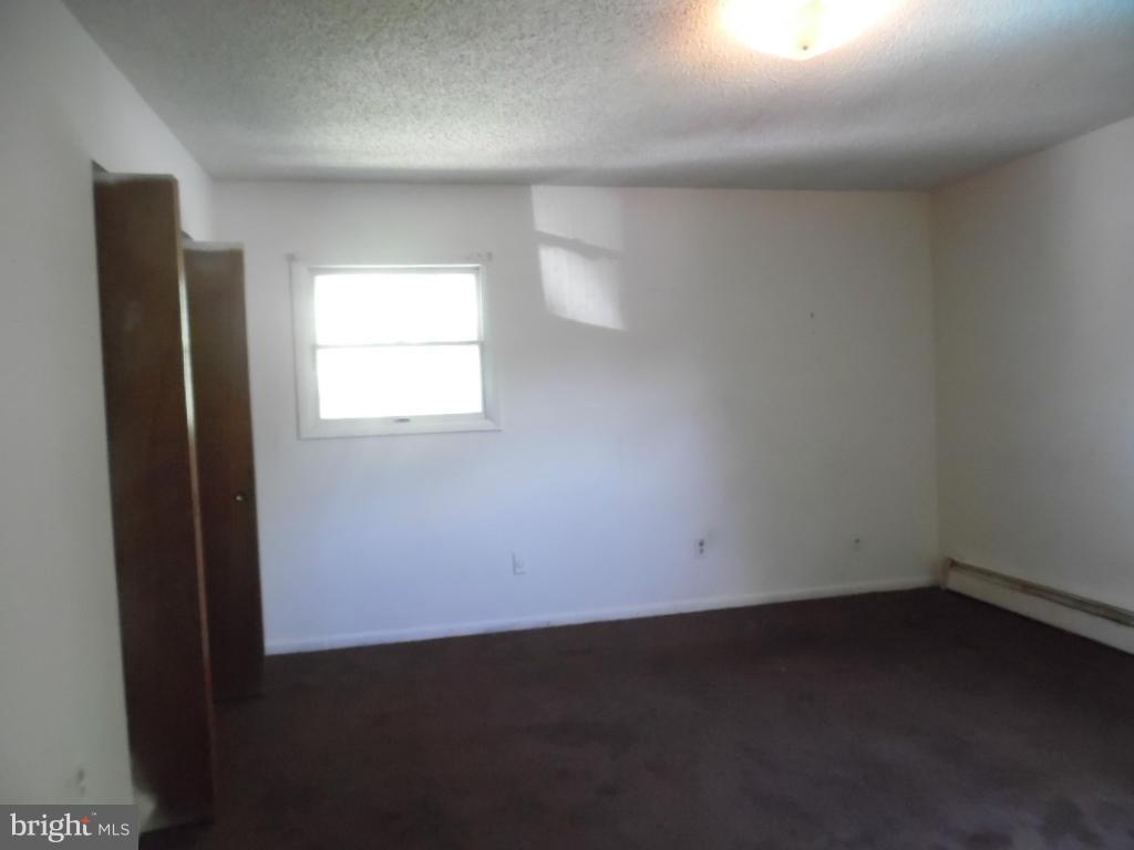 6914 German Hill Road Baltimore, MD 21222 - Photo 26 of 28 an empty room with a window