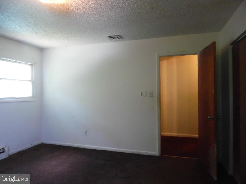 6914 German Hill Road Baltimore, MD 21222 - Photo 27 of 28 an empty room with a window