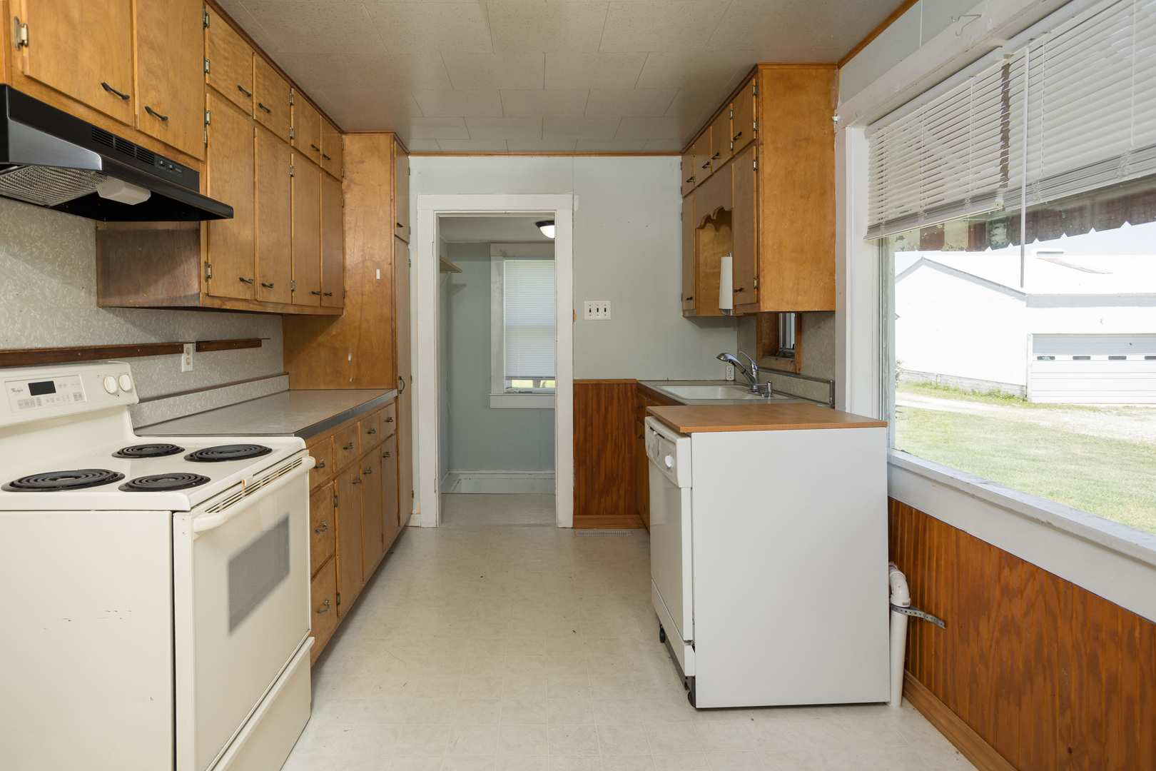 670 East 2300 North Road Danforth, IL 60930 - Photo 13 of 34 a kitchen with a stove cabinets and a refrigerator