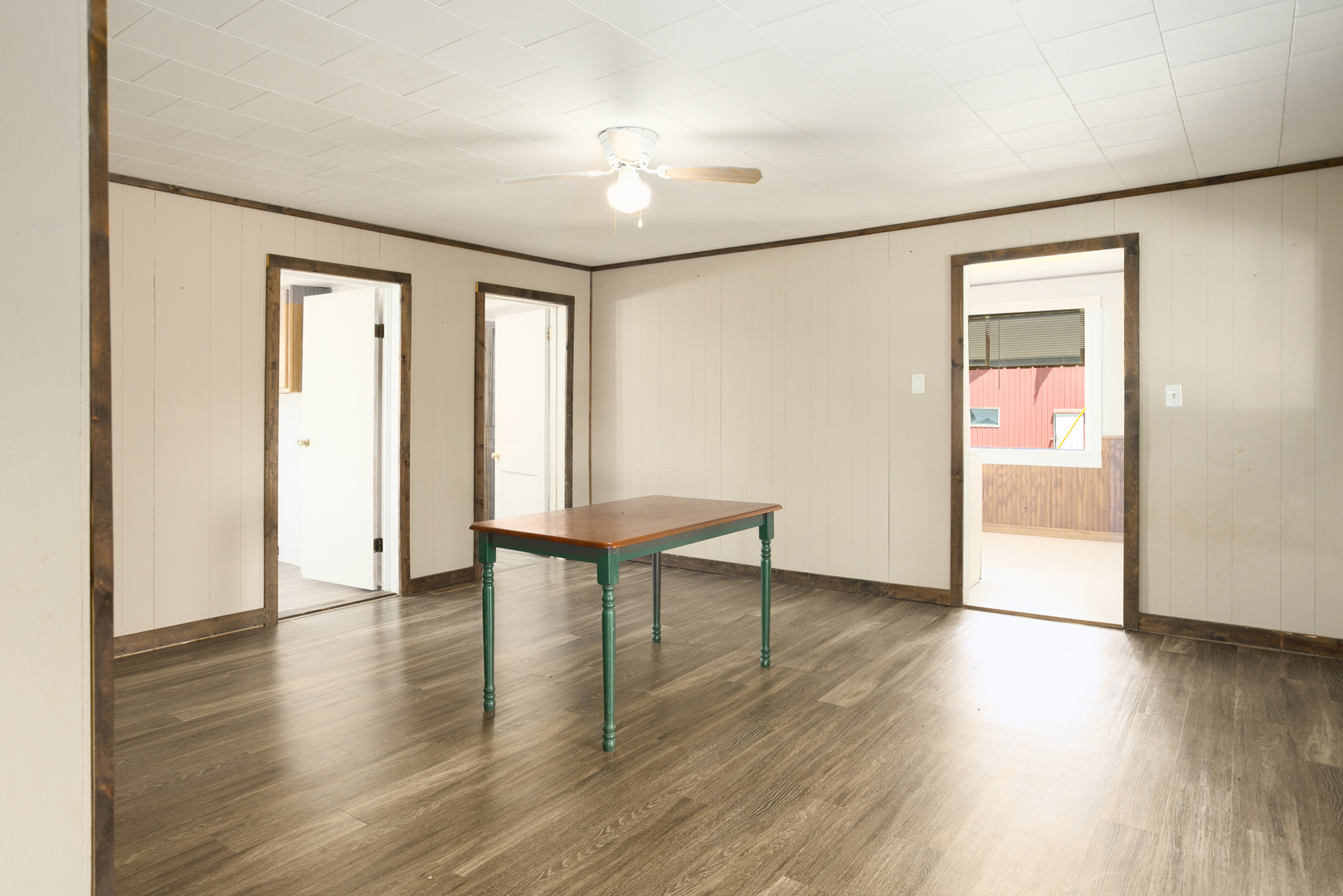 670 East 2300 North Road Danforth, IL 60930 - Photo 16 of 34 an empty room with wooden floor and windows