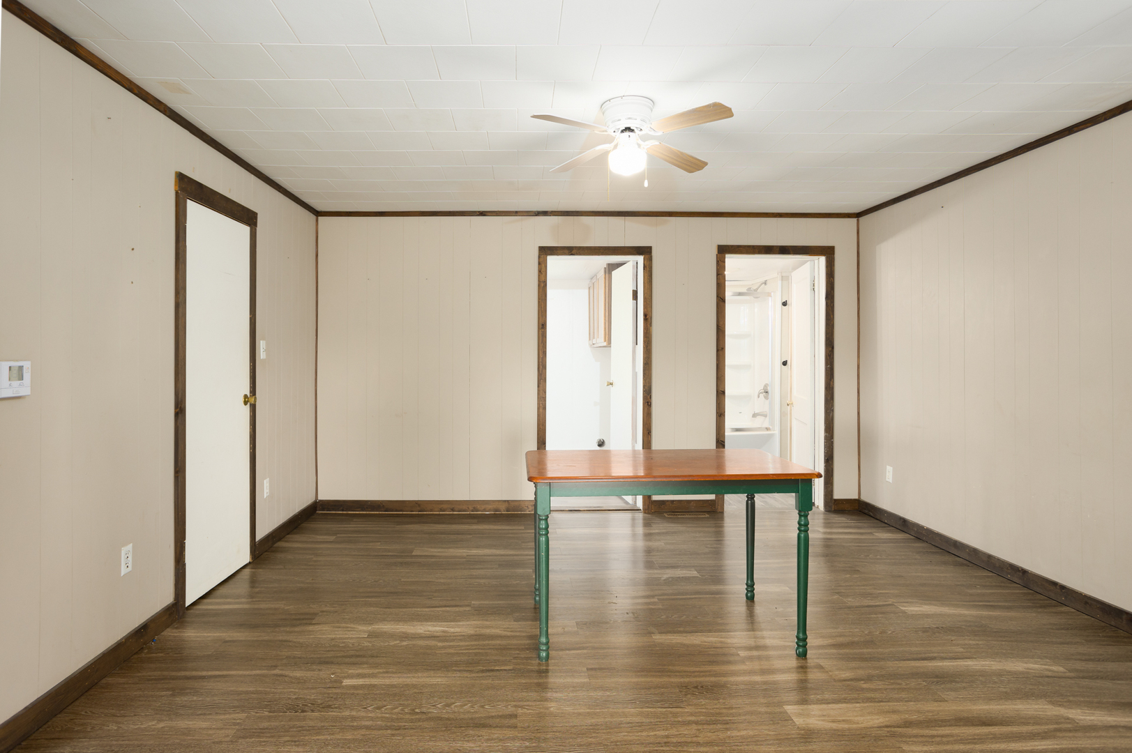 670 East 2300 North Road Danforth, IL 60930 - Photo 21 of 34 a view of an empty room with window and wooden floor