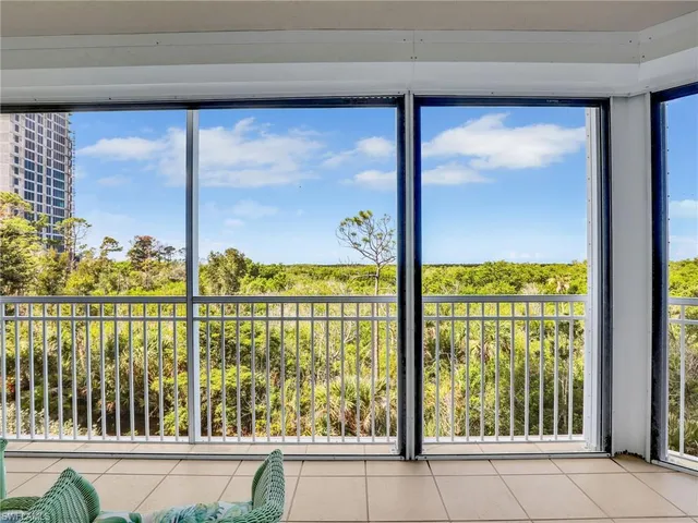 a view of a glass door with a large window