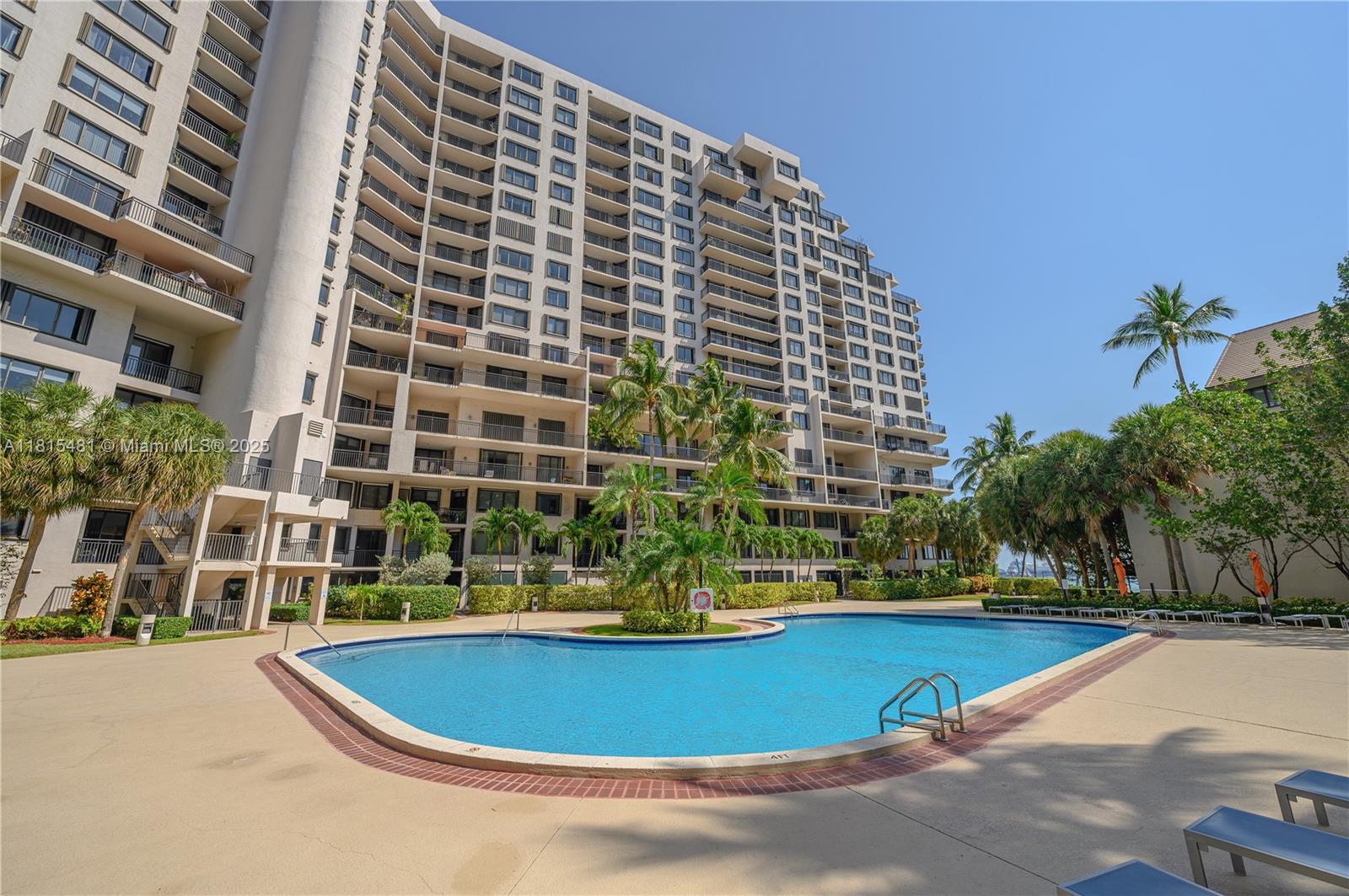 540 Brickell Key Drive, Unit 600 Miami, FL 33131 - Photo 20 of 28 a view of building with yard and swimming pool