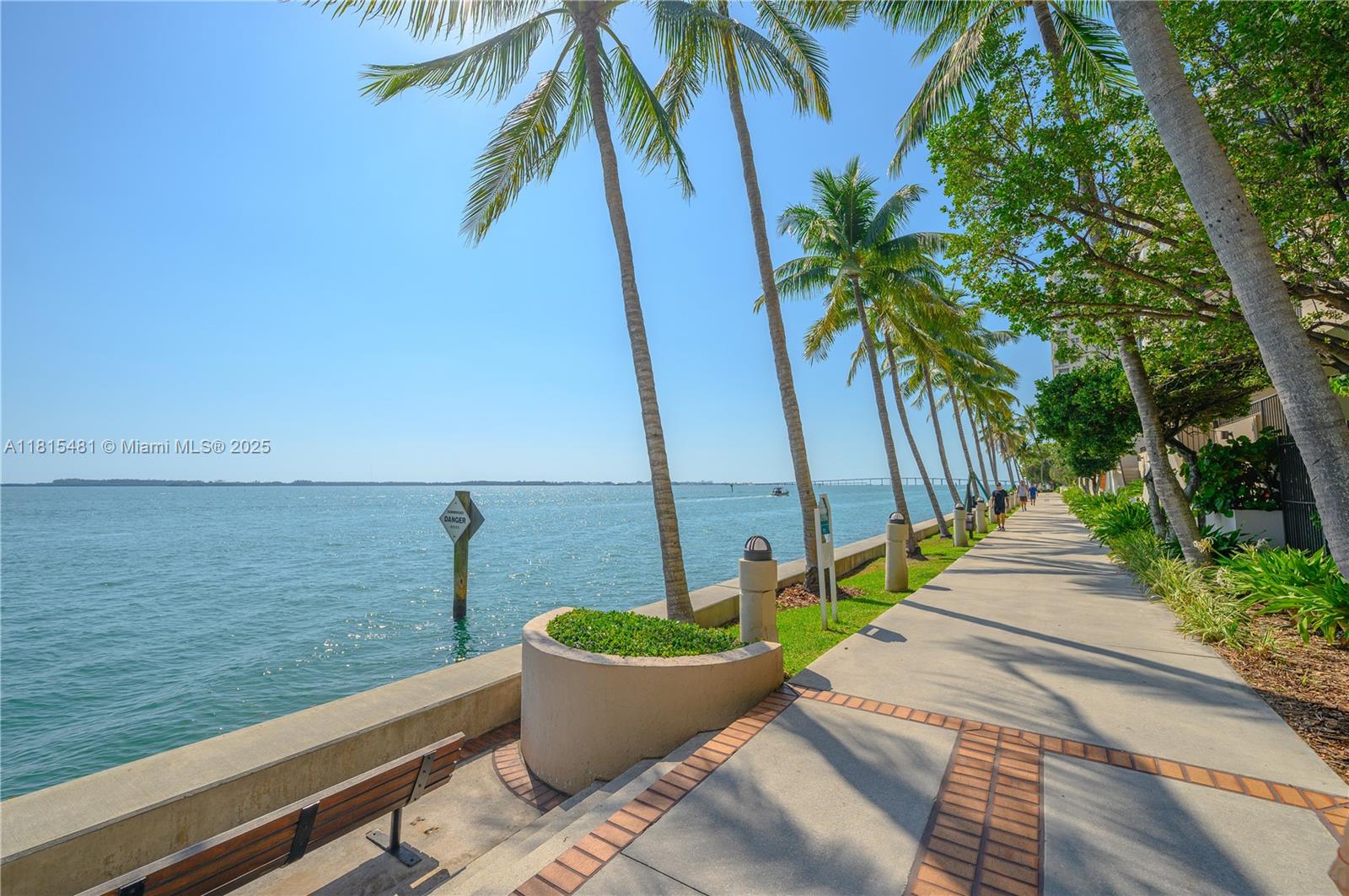 540 Brickell Key Drive, Unit 600 Miami, FL 33131 - Photo 23 of 28 a view of a patio with lawn chairs