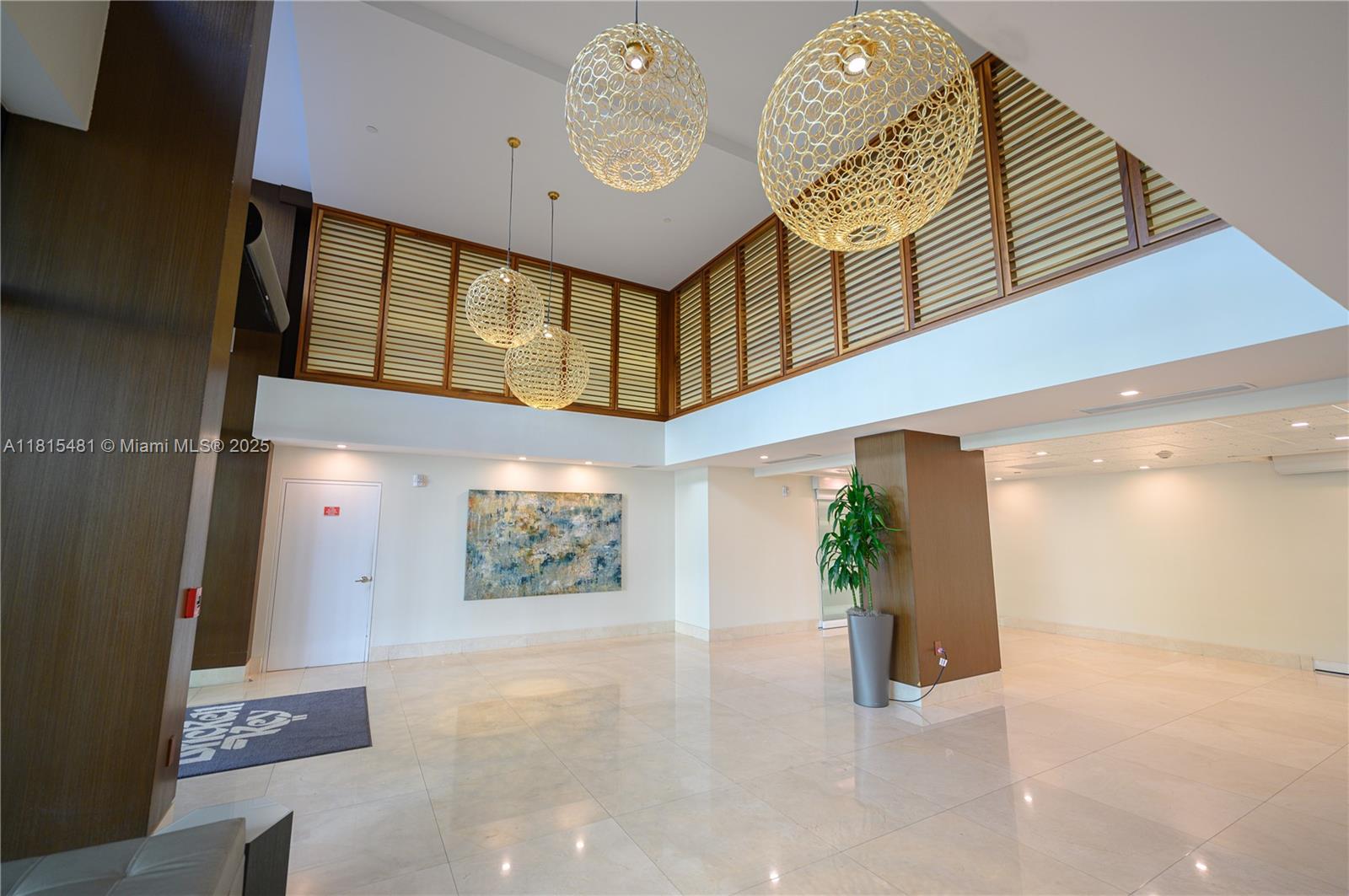 540 Brickell Key Drive, Unit 600 Miami, FL 33131 - Photo 27 of 28 a view of a hallway with entryway