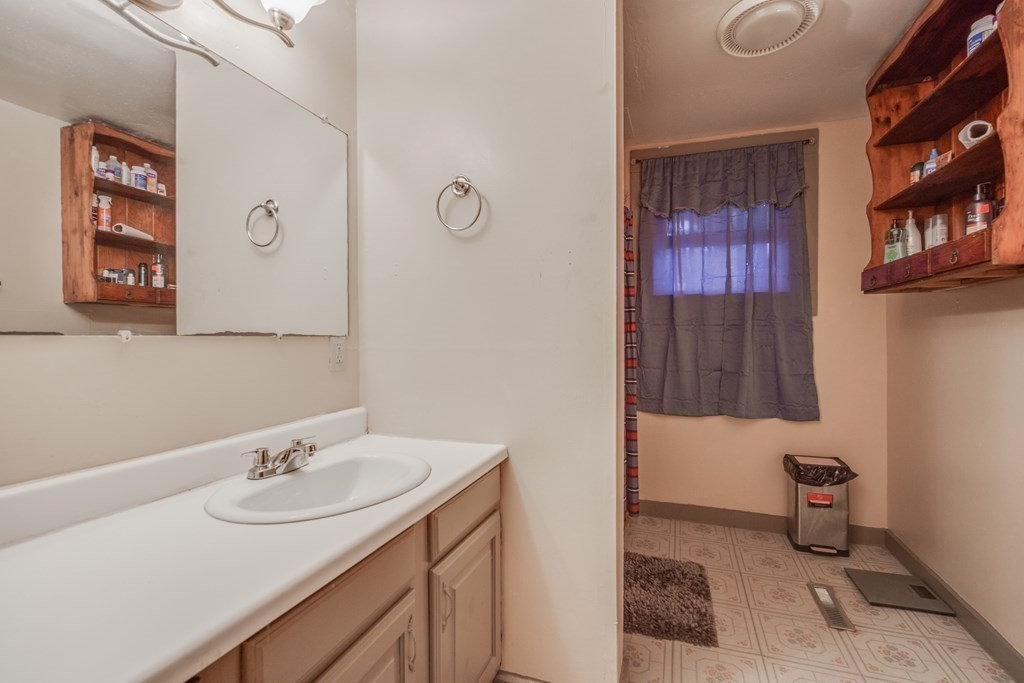 122 Sandisfield Road Sandisfield, MA 01255 - Photo 24 of 41 a bathroom with a sink and a mirror