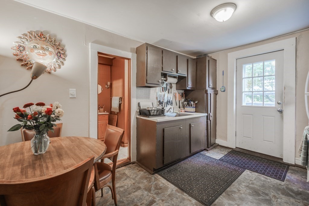122 Sandisfield Road Sandisfield, MA 01255 - Photo 6 of 41 a kitchen with a refrigerator and a sink