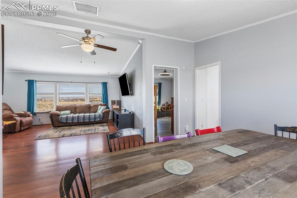 27560 Mid Jones Road Calhan, CO 80808 - Photo 11 of 34 Dining Area Looking into Living Room