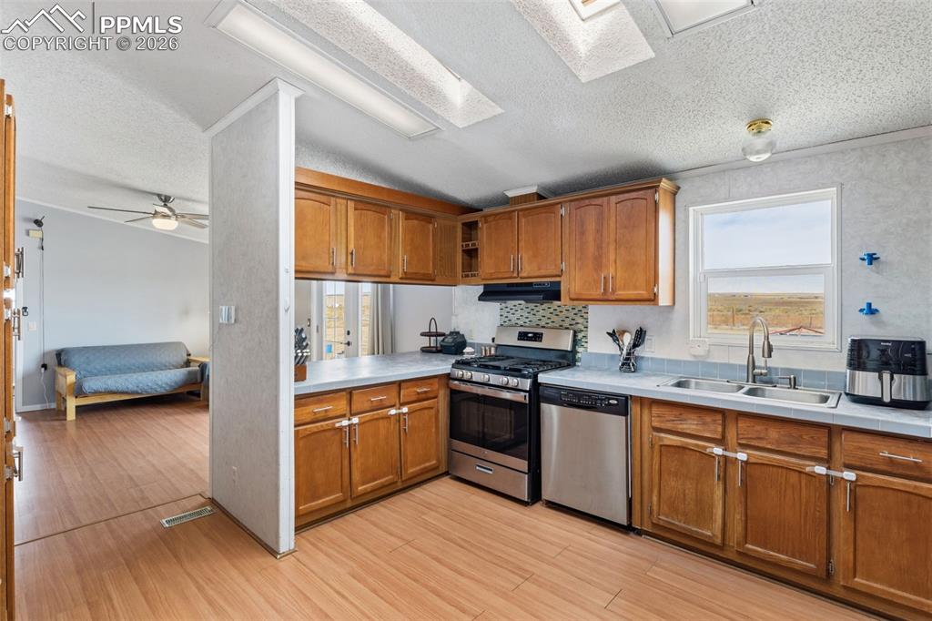27560 Mid Jones Road Calhan, CO 80808 - Photo 13 of 34 Kitchen Features Two Skylights