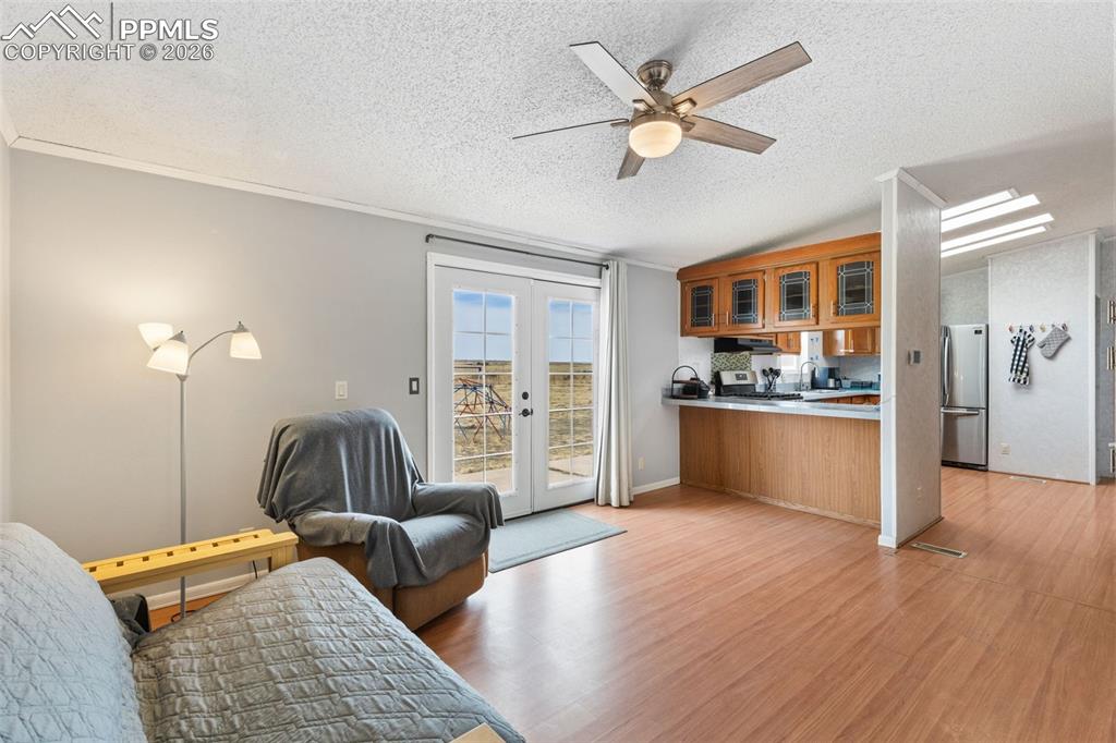 27560 Mid Jones Road Calhan, CO 80808 - Photo 15 of 34 Spacious Family Room