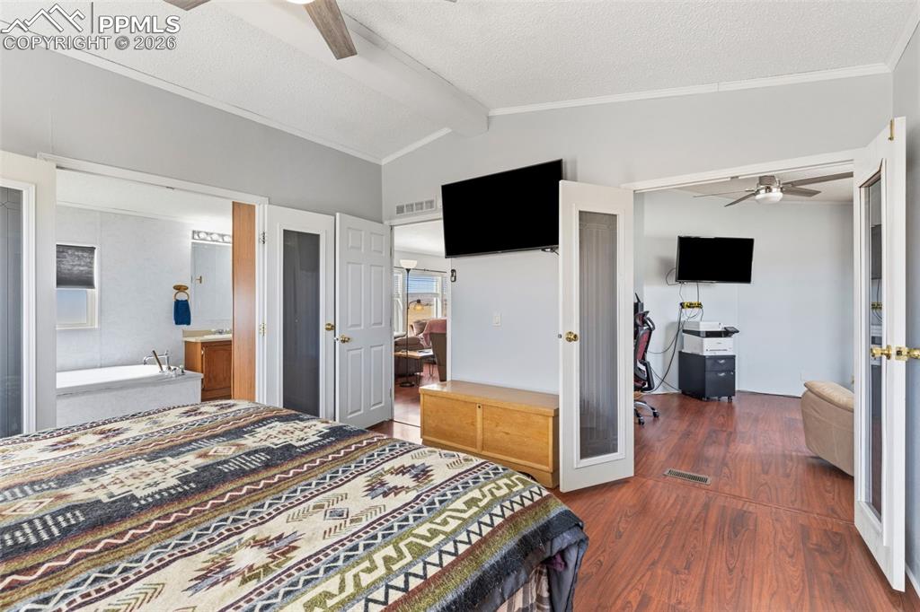 27560 Mid Jones Road Calhan, CO 80808 - Photo 18 of 34 French Doors Adjoining to Private Sitting Area/Office