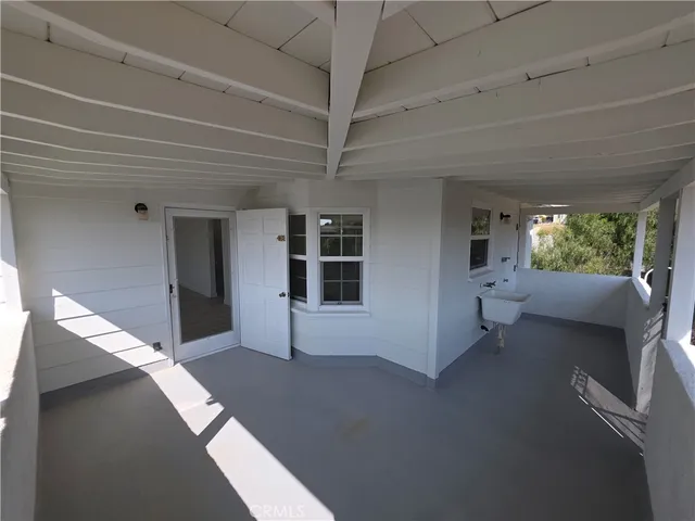 a view of livingroom with furniture and windows