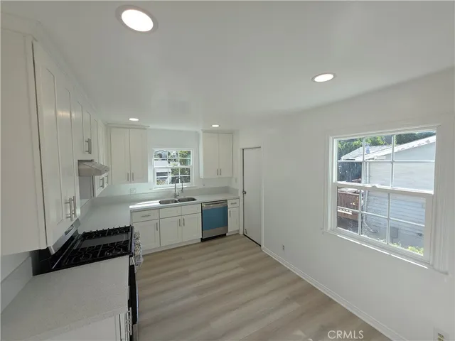 a large kitchen with a lot of counter space