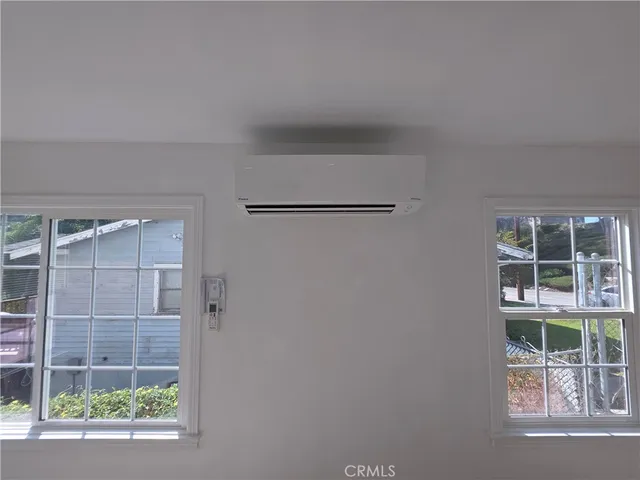 a view of a glass door and a window