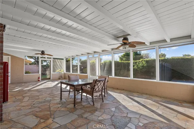 a outdoor space with lots of tables and chairs