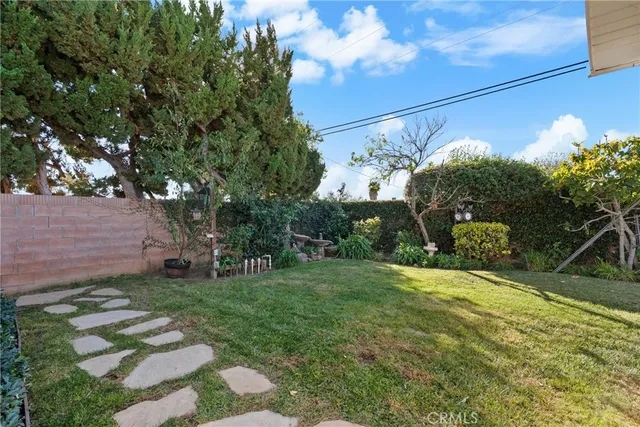 a view of a yard with an trees