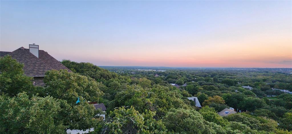 900 Crowley Road Arlington, TX 76012 - Photo 2 of 3 an aerial view of a houses with a yard and lake view