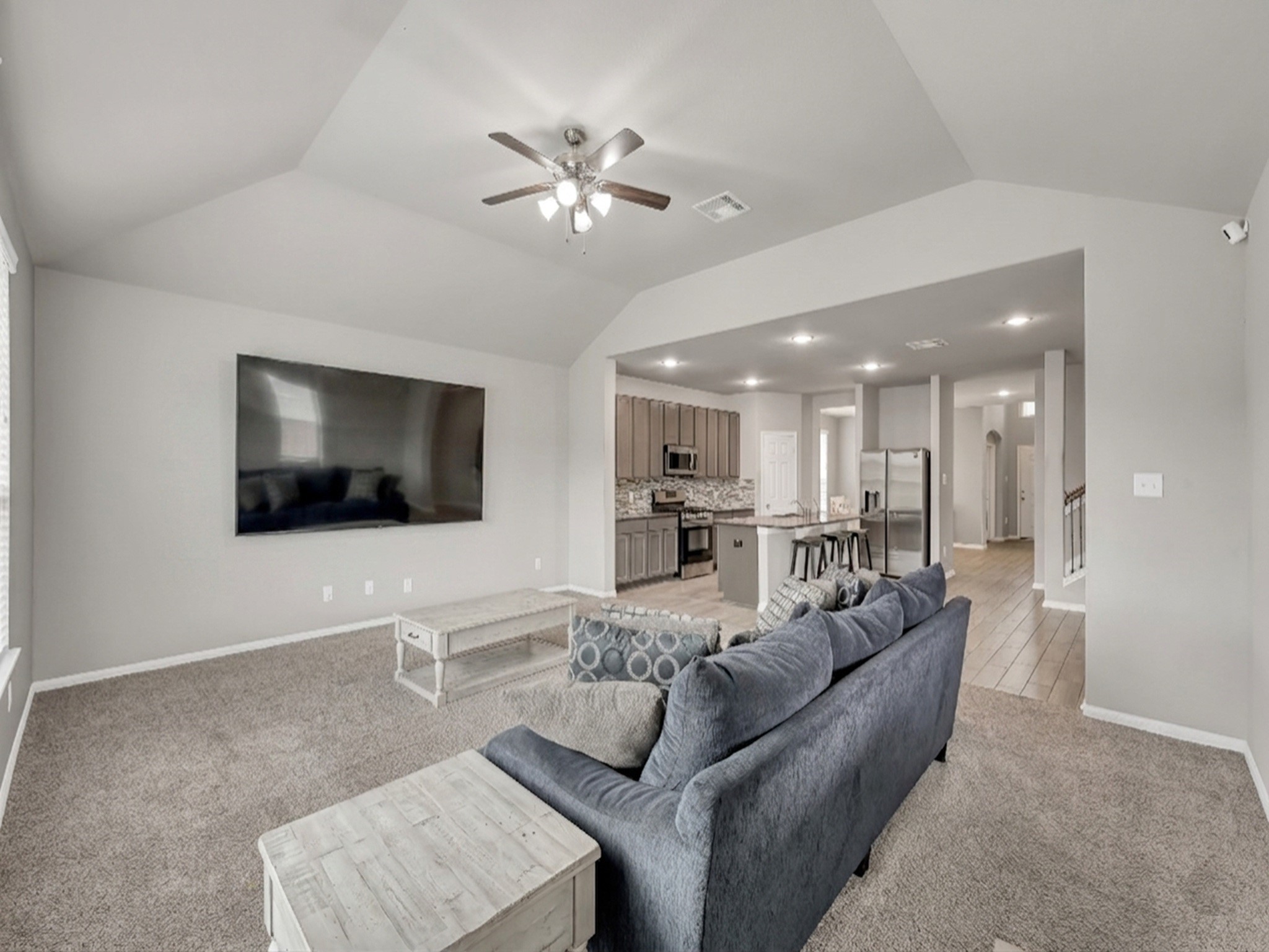 29211 Sequoia Tree Trail Spring, TX 77386 - Photo 9 of 32 a living room with furniture and a flat screen tv