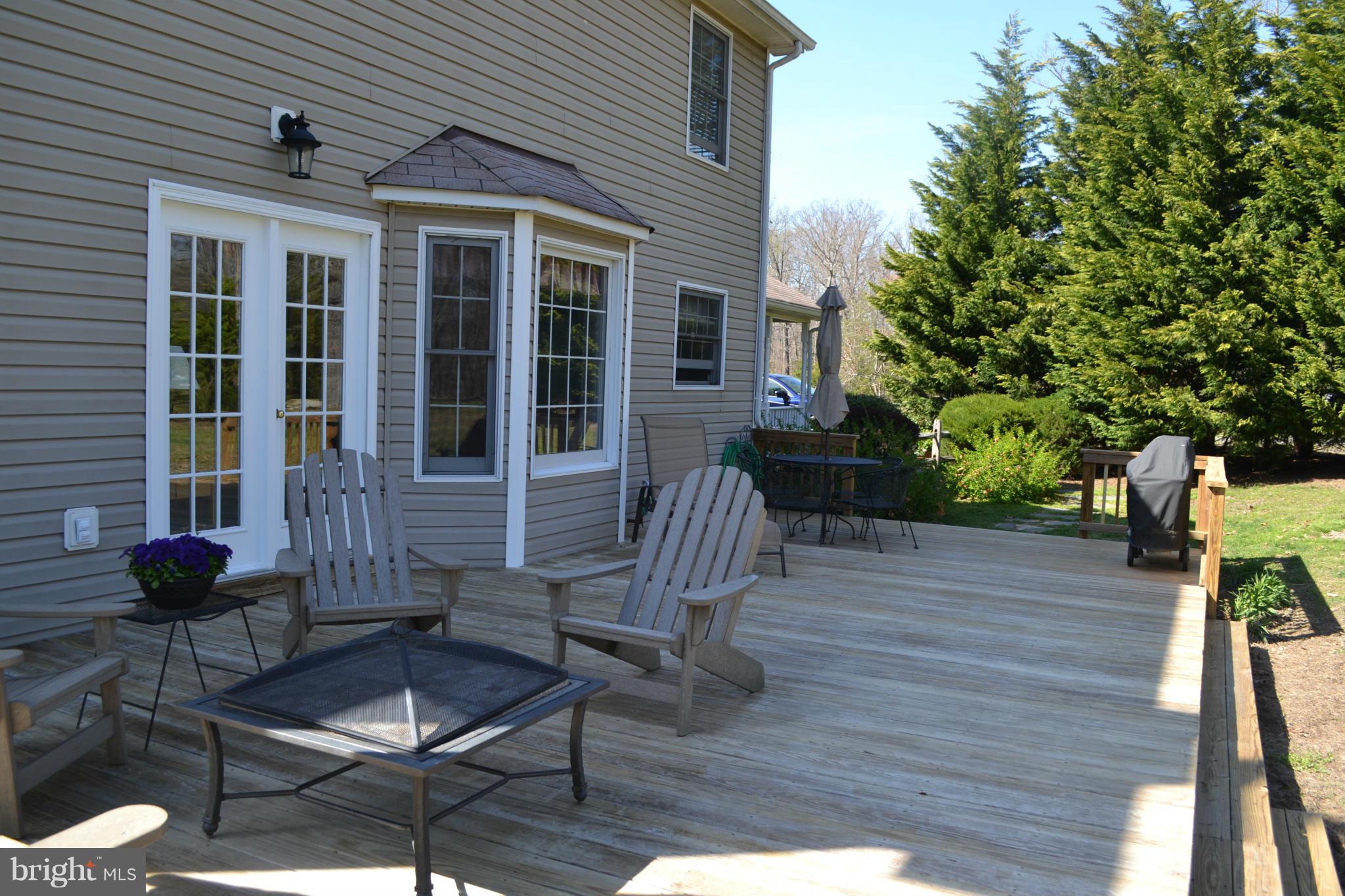 5901 Moore Road Marshall, VA 20115 - Photo 22 of 30 a view of a house with backyard and sitting area