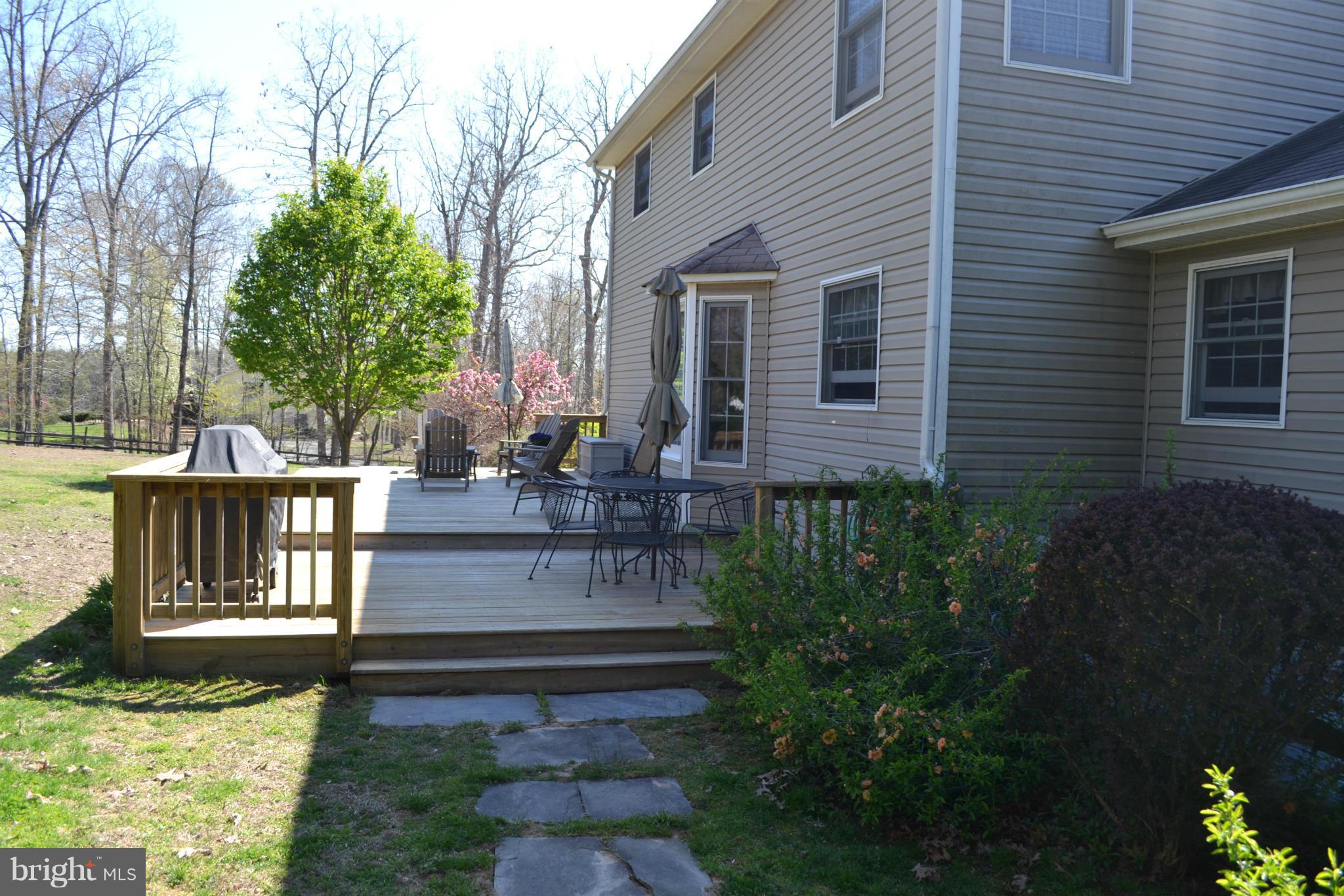 5901 Moore Road Marshall, VA 20115 - Photo 27 of 30 a view of a house with backyard and sitting area