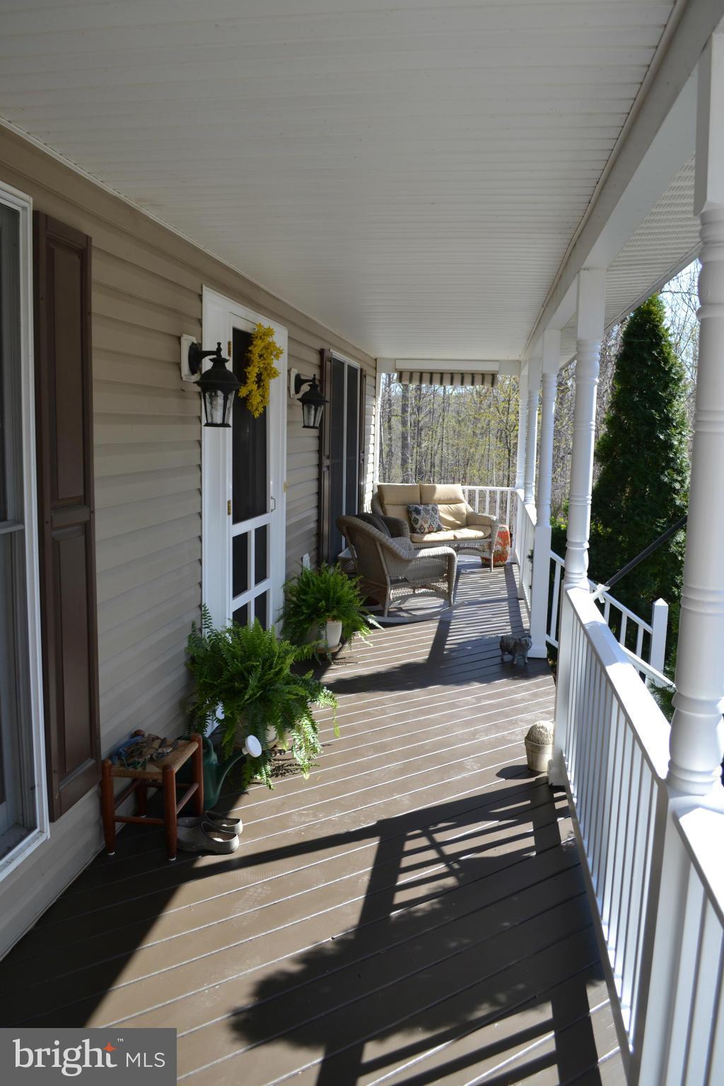 5901 Moore Road Marshall, VA 20115 - Photo 28 of 30 a view of a house with backyard porch and sitting area