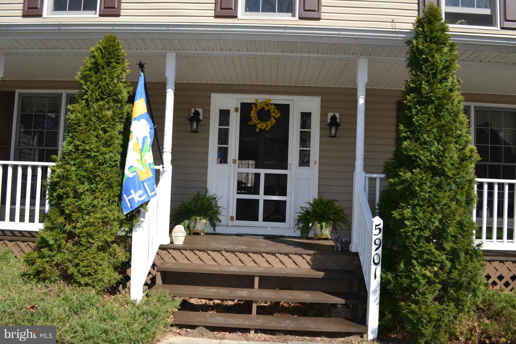 5901 Moore Road Marshall, VA 20115 - Photo 29 of 30 a view of a house with potted plants and a porch