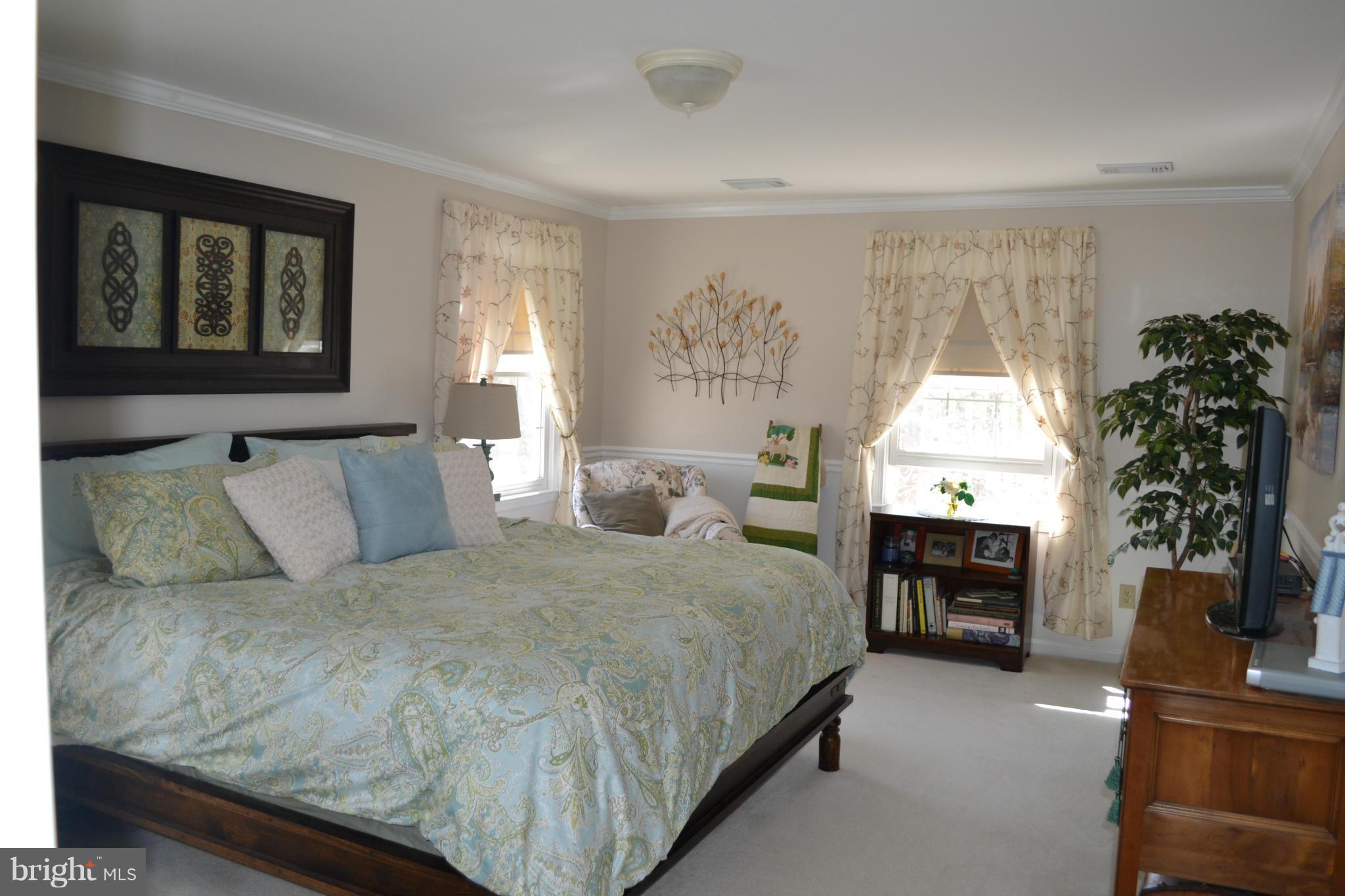 5901 Moore Road Marshall, VA 20115 - Photo 7 of 30 a bedroom with a bed and a fireplace