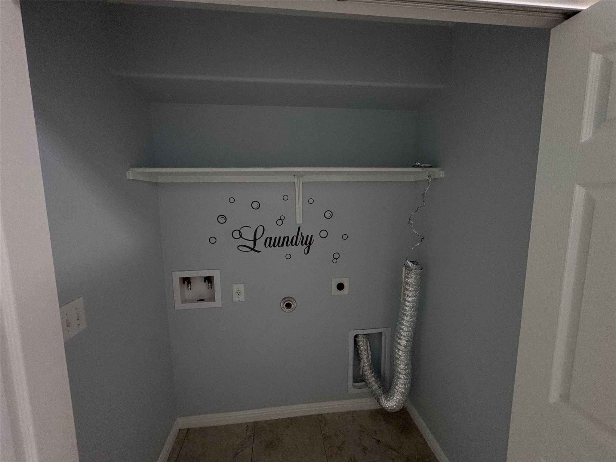 1520 Portchester Castle Path Pflugerville, TX 78660 - Photo 20 of 26 A dedicated laundry closet provides a practical and efficient space for household tasks.