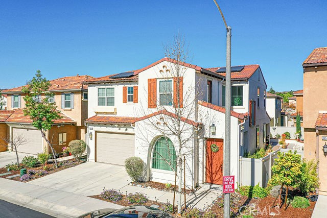 a front view of a house with a porch