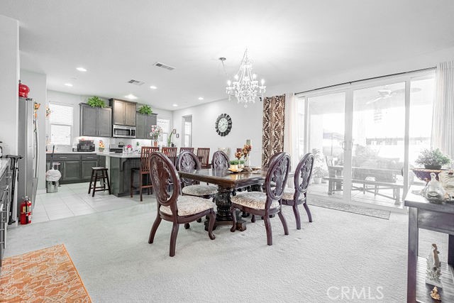 39580 Strada Pozzo Lake Elsinore, CA 92532 - Photo 16 of 67 a view of a dining room and livingroom view