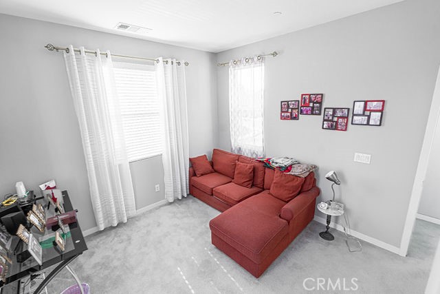 39580 Strada Pozzo Lake Elsinore, CA 92532 - Photo 29 of 67 a living room with furniture and a window