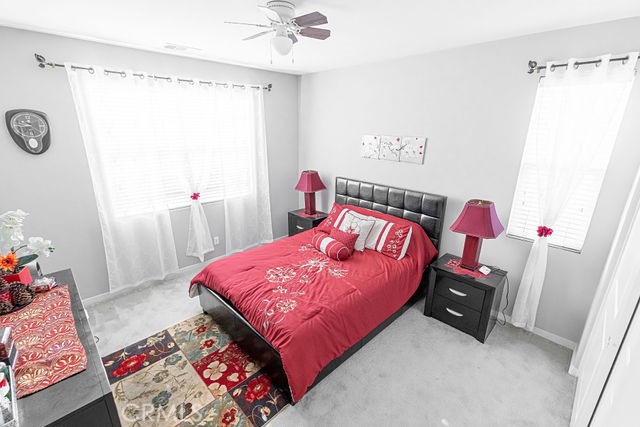 39580 Strada Pozzo Lake Elsinore, CA 92532 - Photo 37 of 67 a bedroom with a bed and a window