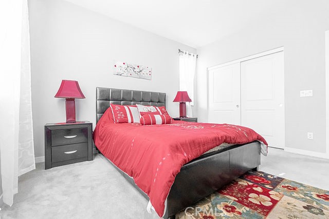 39580 Strada Pozzo Lake Elsinore, CA 92532 - Photo 38 of 67 a bedroom with a bed and a dresser