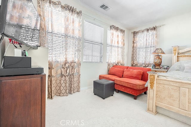 39580 Strada Pozzo Lake Elsinore, CA 92532 - Photo 41 of 67 a living room with furniture and a window