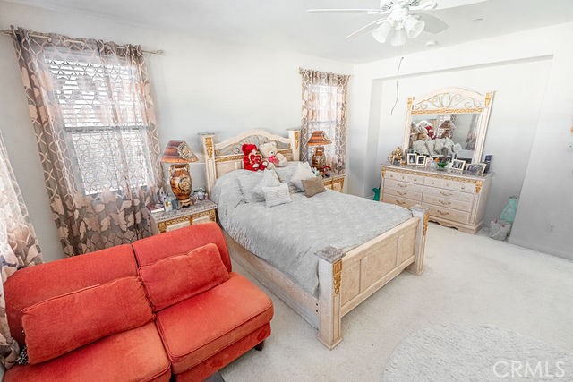 39580 Strada Pozzo Lake Elsinore, CA 92532 - Photo 43 of 67 a bedroom with a bed and a window